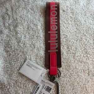 New Lululemon Never List Keychain Word Mark ANCP/GLZP